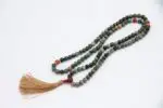 Bloodstone & Carnelian Mala – handcrafted 108-bead prayer necklace made from natural bloodstone and carnelian gemstones, known for boosting energy, courage, and grounding. Ideal for meditation, chakra healing, and spiritual strength.