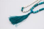 Conch Shell & Turquoise Prayer Beads – handcrafted 108-bead mala made from natural conch shell and turquoise stones, symbolizing purity, protection, and spiritual balance. Ideal for mantra chanting, meditation, and healing rituals.