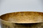 Extra large handmade singing bowl featuring Hindu Om symbol and Tibetan mantra etching