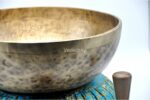 Extra large handmade singing bowl featuring Hindu Om symbol and Tibetan mantra etching