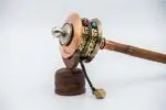 Handheld Dharma prayer wheel engraved with Om Mani Padme Hum