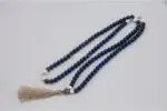 Lapis, Conch Shell & Crystal Mala – handcrafted 108-bead prayer necklace combining lapis lazuli for wisdom, conch shell for purity, and crystal quartz for clarity and spiritual energy. Ideal for meditation, mantra chanting, and chakra alignment.