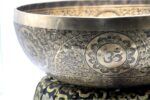 Large handmade Chakra Yogi singing bowl with Om and mantra etching, forged in Nepal
