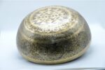 Large handmade singing bowl with Buddha foot carving, chakra symbols, Ashtamangala, and Shree Yantra