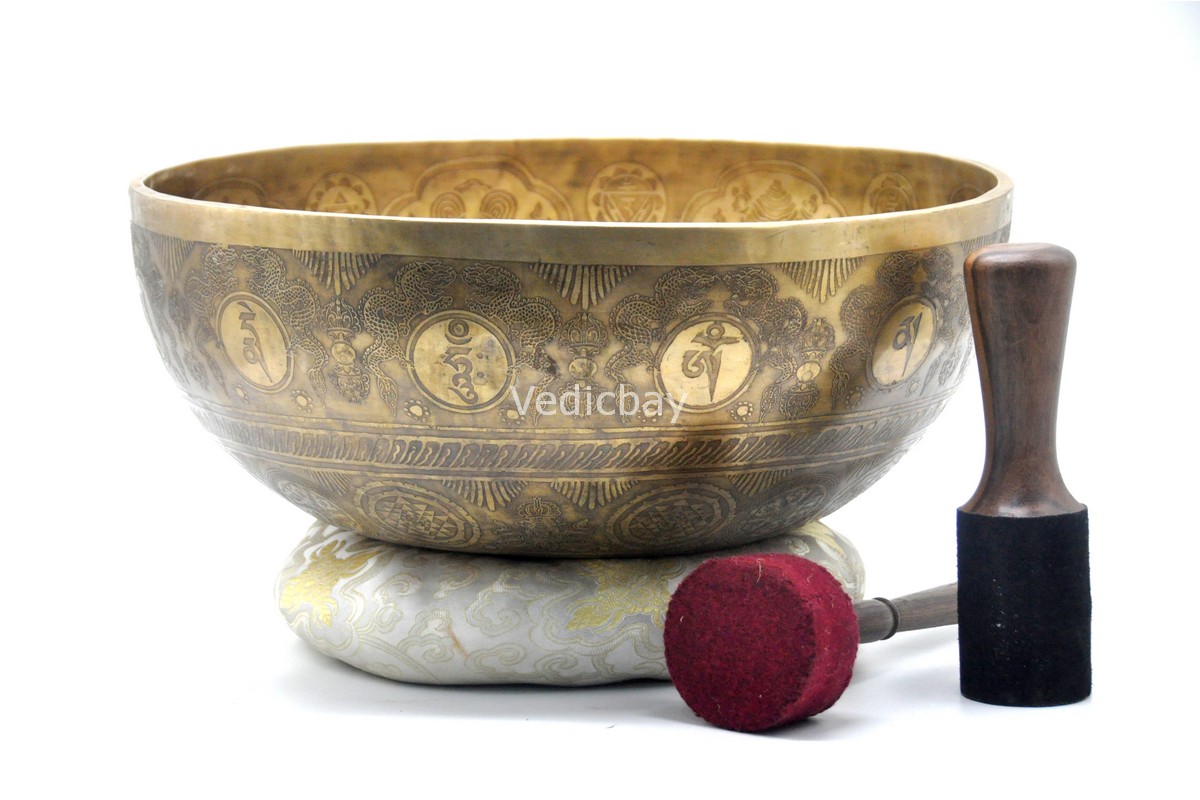 Large handmade singing bowl with Yin Yang Tree of Life design, mantra etching, and chakra healing use