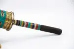 Handcrafted Tibetan Dharma wheel with colorful stones from Nepal