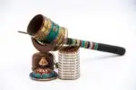 Handcrafted Tibetan Dharma wheel with colorful stones from Nepal
