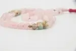 Rose Quartz Mala – handcrafted 108-bead prayer necklace made from natural rose quartz gemstones, symbolizing love, compassion, and emotional healing. Ideal for meditation, heart chakra work, and spiritual rituals.
