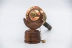 Copper prayer wheel engraved with Om Mani Padme Hum and lucky symbols