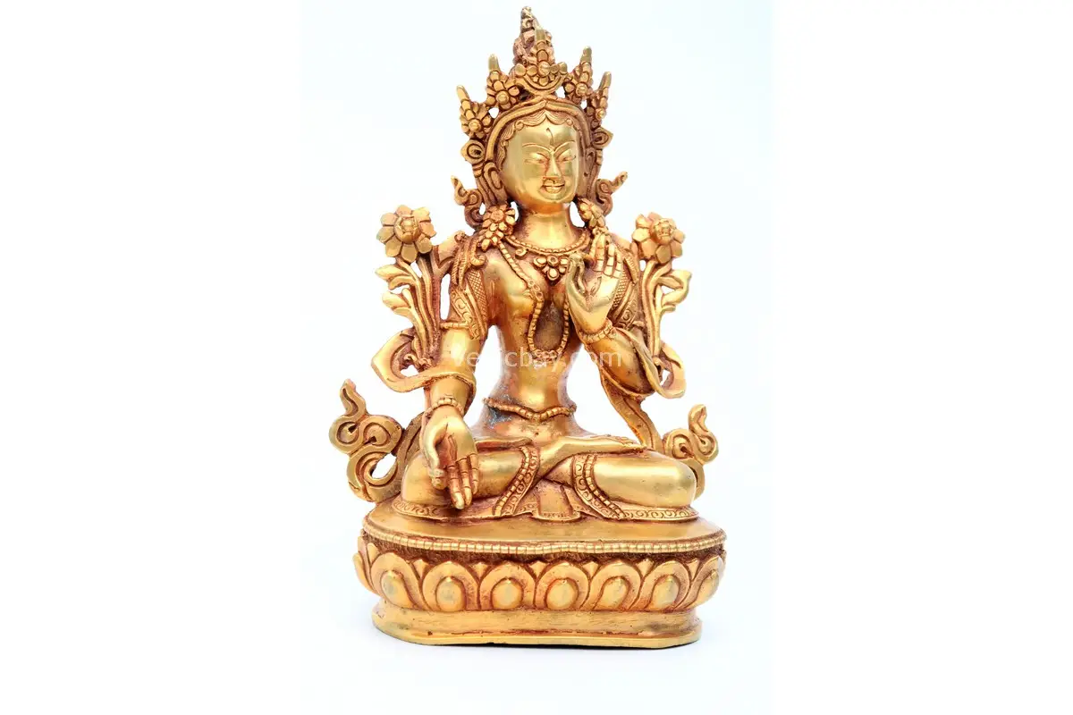 Handcrafted White Tara Statue seated in lotus posture with seven eyes – made from brass with delicate detailing, symbolizing compassion, healing, and longevity in Tibetan Buddhism.