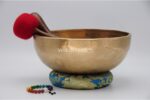 10.5 inch handmade Jhumka singing bowl with dim finish – crafted in Nepal, includes mallet, felt drum stick, cushion, and chakra bracelet