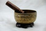 Collected antique Thadobati singing bowl showing natural patina, aged marks, and authentic surface texture
