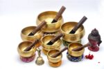 Set of 7 Hand Beaten Chakra Singing Bowls Handmade in Nepal with mallets and cushions