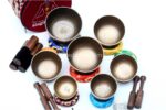 7 Chakra Natural Finish Singing Bowl Set of 7 with mallets, cushions, carry box, and bracelet – handmade in Nepal