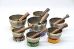 7 Chakra Natural Finish Singing Bowl Set of 7 with mallets, cushions, carry box, and bracelet – handmade in Nepal