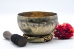 Antique Tibetan Koprebati singing bowl with rounded walls and wide opening
