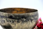 Antique Tibetan Koprebati singing bowl with rounded walls and wide opening