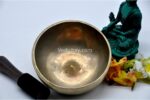 7 inch handmade Tibetan Lingam singing bowl with dim finish – rare Himalayan bowl with central lingam, includes mallet and cushion