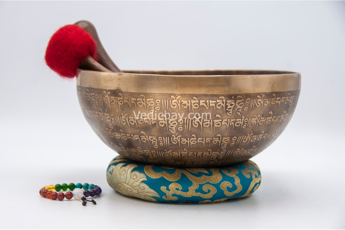 10-inch full mantra Tibetan singing bowl with mantra mandala in center and conch on bottom – includes cushion, wooden mallet, felt striker, and bracelet – VedicBay