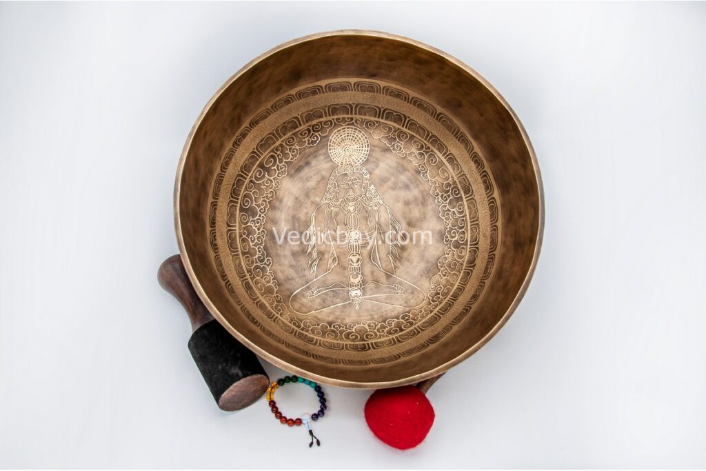 12-inch Yogi Tibetan singing bowl with mantras, lucky symbols, and Double Dorje – includes cushion, wooden mallet, felt striker, and bracelet – VedicBay